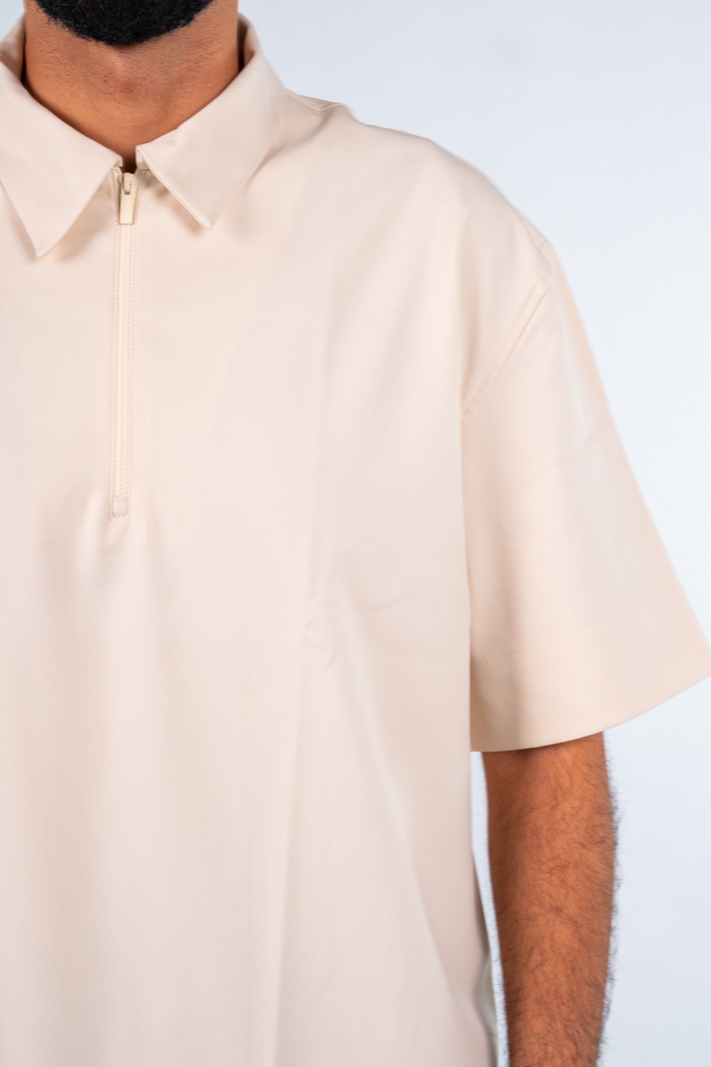 Beige Quarter-Zip Short Sleeve Polo Shirt | قميص بولو بيج نص كم بسوستة