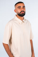 Beige Quarter-Zip Short Sleeve Polo Shirt | قميص بولو بيج نص كم بسوستة