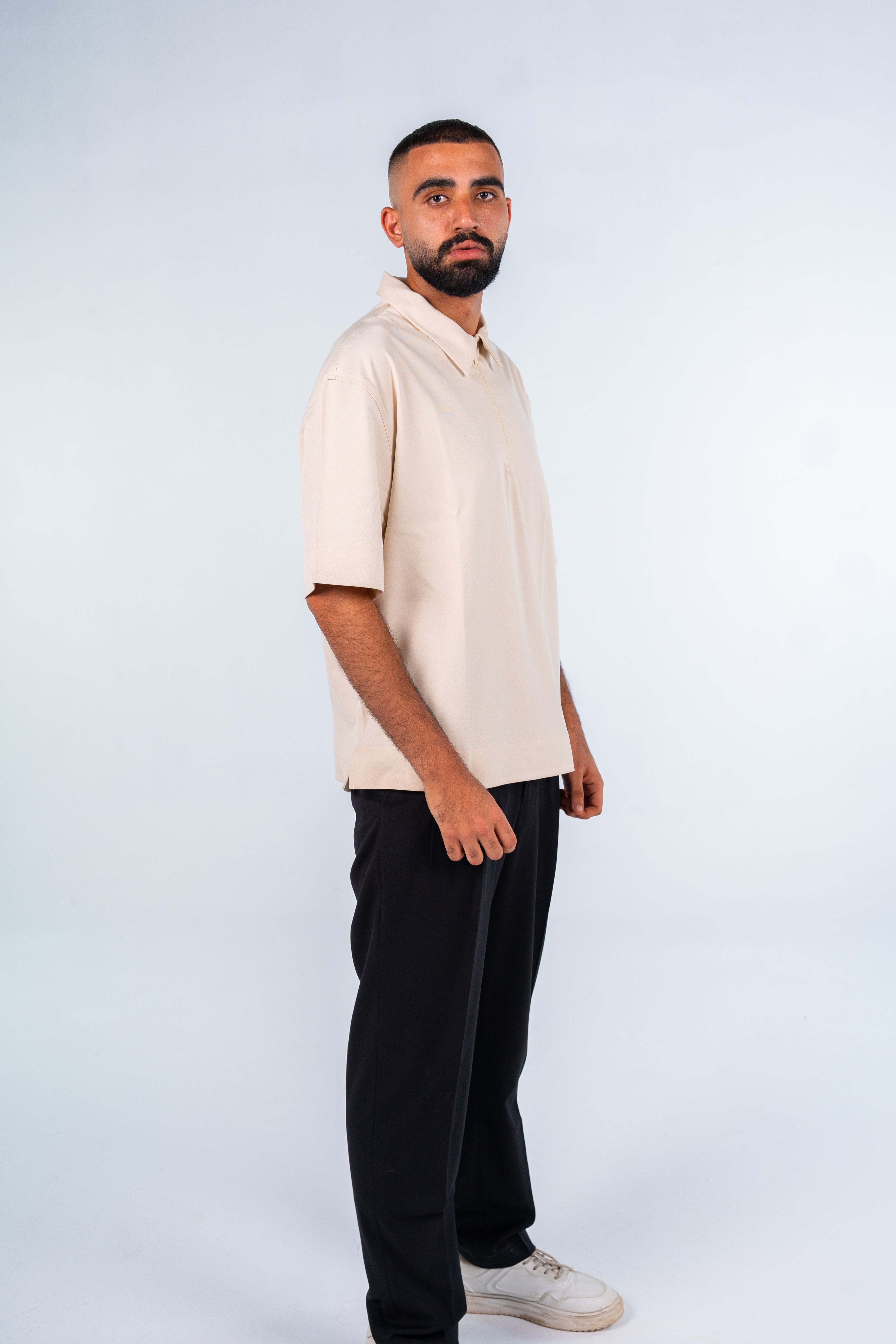Beige Quarter-Zip Short Sleeve Polo Shirt | قميص بولو بيج نص كم بسوستة